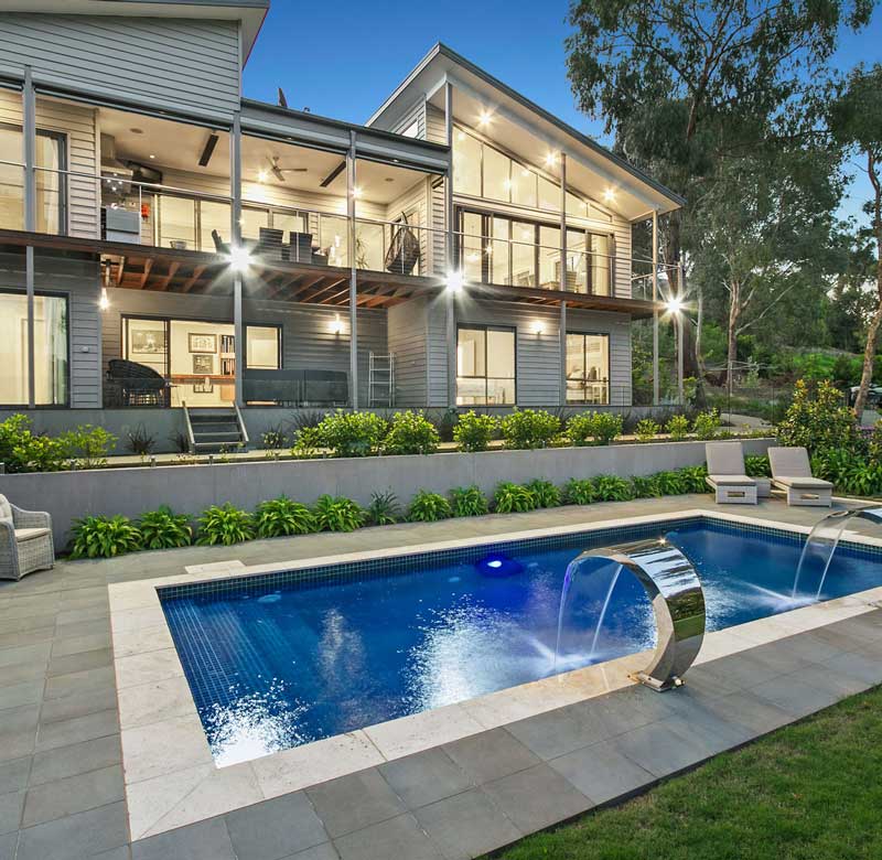 inground pool design with landscaping by Ultimate Swimming Pools and Spas in Melbourne